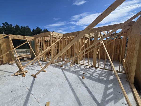 Roof trusses and framing on a finished concrete slab