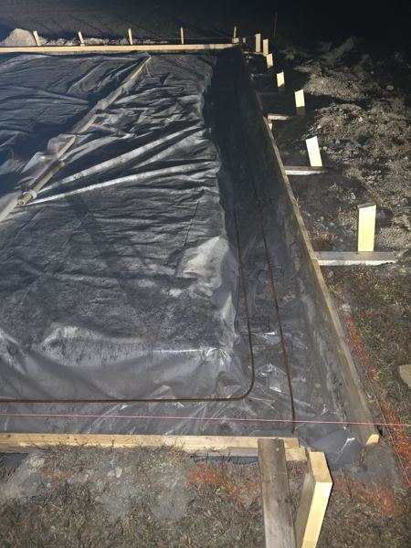Vapor barrier laid inside slab forms